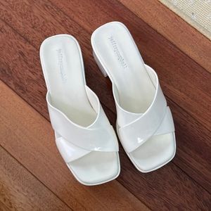 jeffrey campbell - white platform flip flops - bride change into for reception
